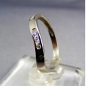 Zlatý dámsky prsteň biele zlato kamienky v pravidelných intervaloch VP54151B